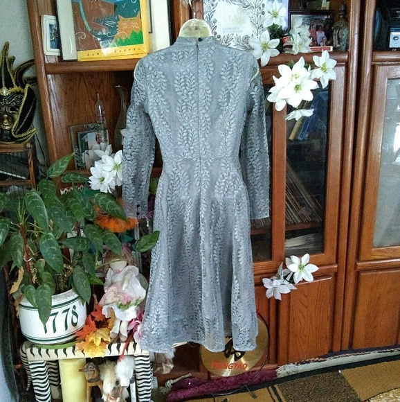 NEXIIA ELEGANT LONG SLEEVE PIERCED MIDI DRESS - Picture 2 of 5